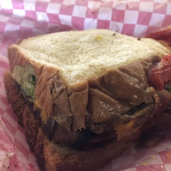 Wholly Cow - A cheese burger with Texas buns, cheddar cheese, avocado, grilled onions, mushrooms and bell peppers. - Burgers Near Me - Austin, Texas