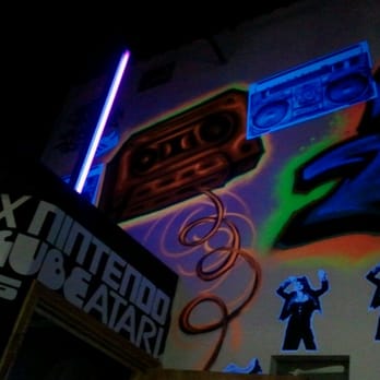 Deloreans - a building with a neon sign on it - Dive Bars Near Me - McAllen, Texas Deloreans - a building with a neon sign on it - Dive Bars Near Me - McAllen, Texas