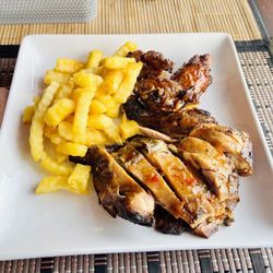 Peppa’s Jerk-Spot - Jerk chicken wings and breast with French fries