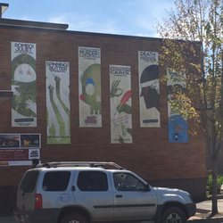 A.C.T. Window Films - Banners installed on the exterior of a building in Hillsboro.