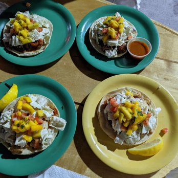Coconuts Fish Cafe - Top: kalua pork Bottom: fish taco - Seafood Near Me - Kihei, Hawaii Coconuts Fish Cafe - Top: kalua pork Bottom: fish taco - Seafood Near Me - Kihei, Hawaii