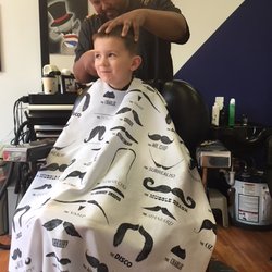Mr Cuts - Maurice cutting Carson's hair