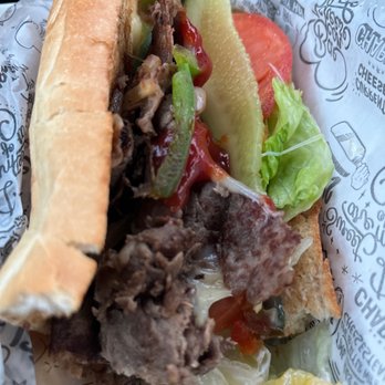 Charleys Cheesesteaks - Half of my PHILLY CHEESESTEAK - Cheesesteaks Near Me - Hyattsville, Maryland