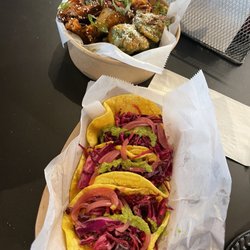 Impact Sports Bar and Grill - Pork belly tacos and versus wings