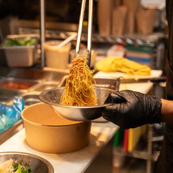 Little Thai Peacock - a person holding a bowl of noodles - Thai Near Me - Portland, Oregon Little Thai Peacock - a person holding a bowl of noodles - Thai Near Me - Portland, Oregon
