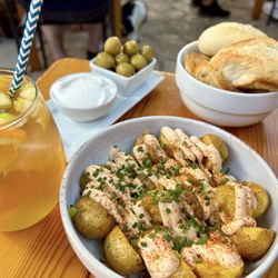 Es Roquessar - Patatas Bravas (bread and olive in background)