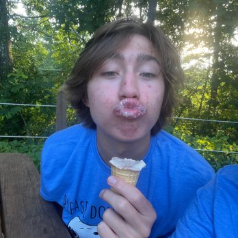 Bibo's - a boy eating an ice cream cone - Hot Dogs Near Me - Franklin, Pennsylvania Bibo's - a boy eating an ice cream cone - Hot Dogs Near Me - Franklin, Pennsylvania