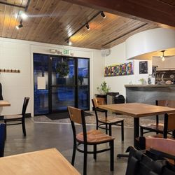 Jebale Coffee - More photos of the seating, front entrance & some wall art