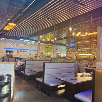 KPOT Korean BBQ & Hot Pot - Seating area - Korean Near Me - Syracuse, New York KPOT Korean BBQ & Hot Pot - Seating area - Korean Near Me - Syracuse, New York
