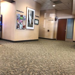 Fairview Clinics - Expansive waiting area with reception, restrooms, and vending.
