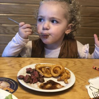 Beef 'O' Brady's - My daughter enjoying her steak - Pubs Near Me - Auburndale, Florida