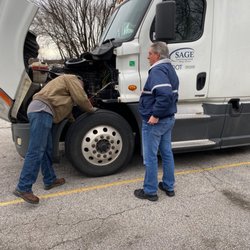 Sage Truck Driving Schools - Ft. Pierce - Sage student and instructor go over vehicle front end inspections.
