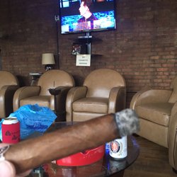 Cigar Cigars - Two TVs and one rule. Don't move the furniture and no cigarette smoking. Ok, two rules.