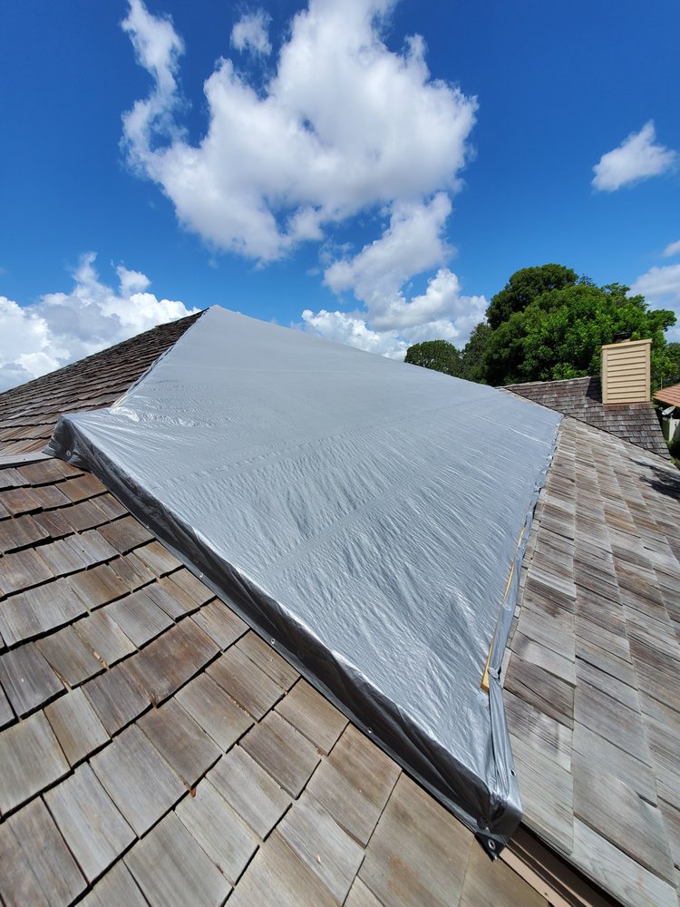 Slide of RoofTop Tarping