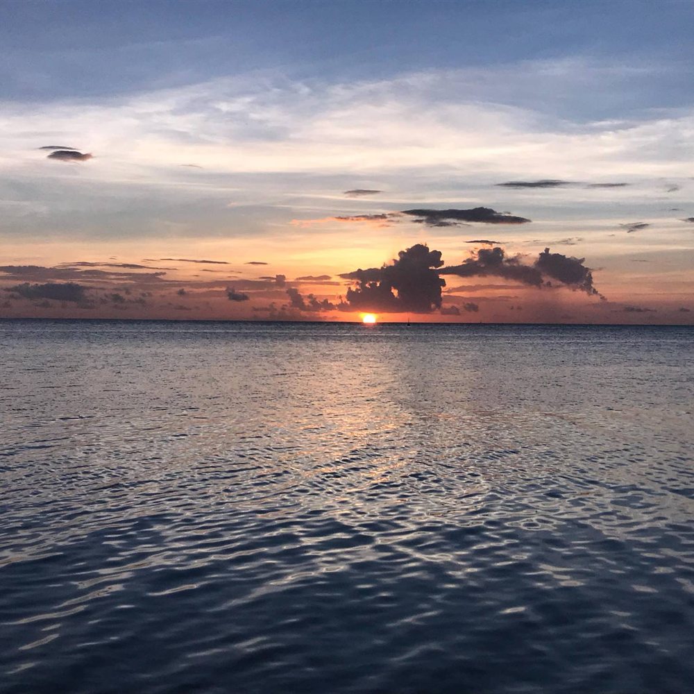 Tahiti Legends - Sunset from Matira Beach, steps from InterContinental Bora Bora Le Moana - Travel Services Near Me - Santa Ana, California