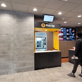 McDonald's - a woman standing in front of a counter - Fast Food Near Me - Brooklyn, New York McDonald's - a woman standing in front of a counter - Fast Food Near Me - Brooklyn, New York