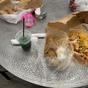 The Juicy Crab - Memphis - Sorry! Already had started eating! But this is this the snow crab bag. Be sure to dip in that delicious sauce in the bottom of the bag!' - Seafood Near Me - Memphis, Tennessee