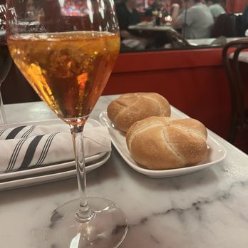 The Stinking Rose - Aperol Spritz with Bread Rolls (Acme) - Italian Near Me - San Francisco, California The Stinking Rose - Aperol Spritz with Bread Rolls (Acme) - Italian Near Me - San Francisco, California