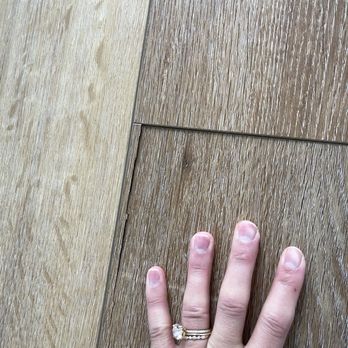 The Floors Network - Broken floorboard from uneven subfloor - Flooring Near Me - San Pedro, California
