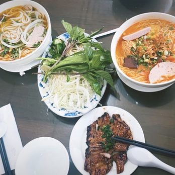 Pho Sydney - Bun bo hue (top left), bean sprouts/lime and mint leaves (for you to add to noodle soup), bun rieu (top right) and a side of pork chop - Vietnamese Near Me - Atlantic City, New Jersey Pho Sydney - Bun bo hue (top left), bean sprouts/lime and mint leaves (for you to add to noodle soup), bun rieu (top right) and a side of pork chop - Vietnamese Near Me - Atlantic City, New Jersey