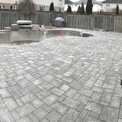 Latitude Land Effects - 1200 square foot interlocking patio with 2 tier water feature.