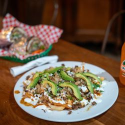 Taqueria El Cruzero - Steak fries with added grilled onions, salsa, cilantro and avocado ! My fave.