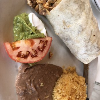 Pancho Pistolas - Chicken burrito dinner with the rice, beans and guac. - Mexican Near Me - Chicago, Illinois Pancho Pistolas - Chicken burrito dinner with the rice, beans and guac. - Mexican Near Me - Chicago, Illinois