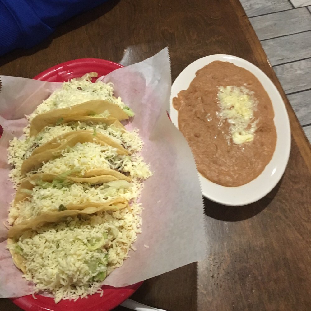 El Potrero - Get the tacos 5 for $5 on Tuesdays! Medium shells are great (semi soft; corn)! The beans shown are extra ($1.80). - Mexican Near Me - Flint, Michigan El Potrero - Get the tacos 5 for $5 on Tuesdays! Medium shells are great (semi soft; corn)! The beans shown are extra ($1.80). - Mexican Near Me - Flint, Michigan