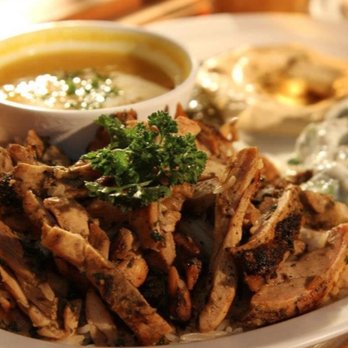 Baba Pita - Mediterranean & Persian Cuisine - a plate of food on a table - Mediterranean Near Me - Chicago, Illinois Baba Pita - Mediterranean & Persian Cuisine - a plate of food on a table - Mediterranean Near Me - Chicago, Illinois