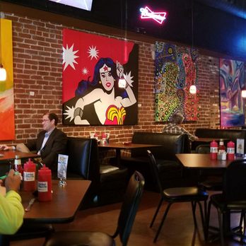 Bite Me BBQ - Cool artwork in huge dining room - Barbeque Near Me - Wichita, Kansas