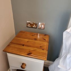 Seven Stars Hotel - A real bedside table on both sides of the bed.