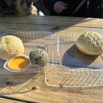 Mee Sum Pastry - Beef curry bao, green tea sesame ball and custard tart. On the right a pineapple bao - Seafood Near Me - Seattle, Washington Mee Sum Pastry - Beef curry bao, green tea sesame ball and custard tart. On the right a pineapple bao - Seafood Near Me - Seattle, Washington