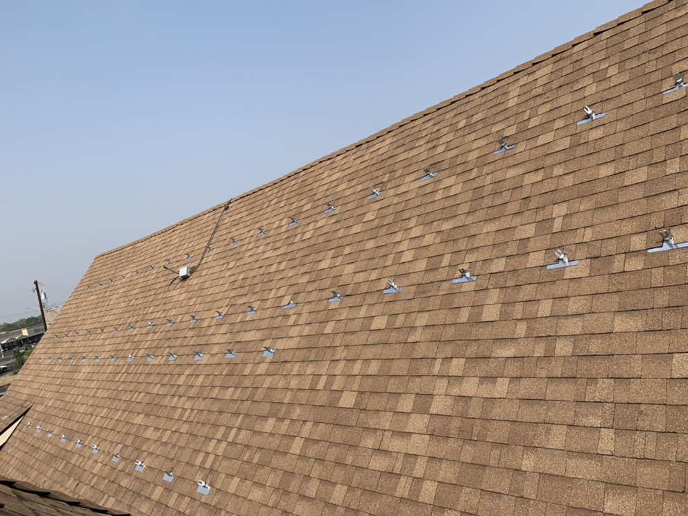 Slide of Ortiz Roofing