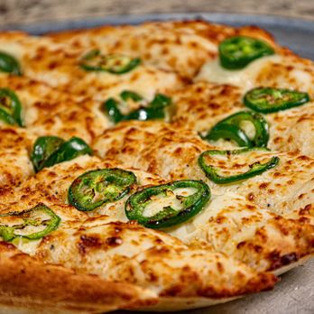 Beehive Pizza Company - Jalapeno Cheese Bread: Cheese bread and jalapeno poppers got together and made this beauty. - Pizza Near Me - Riverton, Utah Beehive Pizza Company - Jalapeno Cheese Bread: Cheese bread and jalapeno poppers got together and made this beauty. - Pizza Near Me - Riverton, Utah