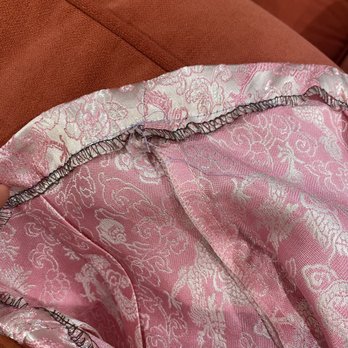 Han's Tailor - Photos of Han's extremely poor craftsmanship including uneven fabric cutting, lopsided serging, and fabric puckering. - Sewing & Alterations Near Me - Alhambra, California Han's Tailor - Photos of Han's extremely poor craftsmanship including uneven fabric cutting, lopsided serging, and fabric puckering. - Sewing & Alterations Near Me - Alhambra, California