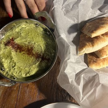 Zizi Wine Bar - a bowl of guacamole and bread - Wine Bars Near Me - New York, New York Zizi Wine Bar - a bowl of guacamole and bread - Wine Bars Near Me - New York, New York