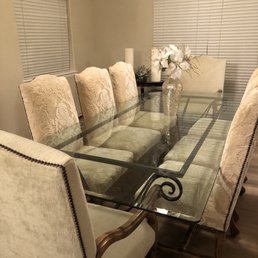 Large iron based, glass top table. Large iron based, glass top table.