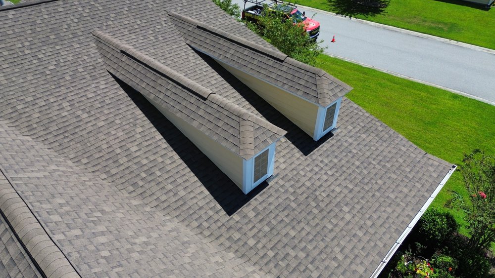 Slide of Whipple Roofing