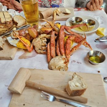The Crab Pot - Pound os crab legs with potatoes and corn. - Seafood Near Me - Seattle, Washington