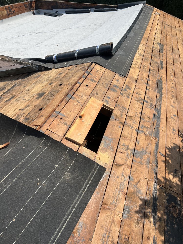 Slide of Ortiz Roofing