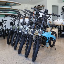 Current Riders - A lineup of electric bikes available inside our shop in Fort Myers Beach.