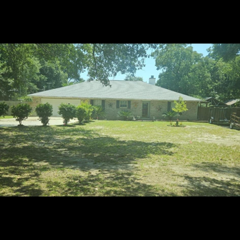 Off The Grid Lawncare And Landscape - a house in the distance - Lawn Services Near Me - Pensacola, Florida Off The Grid Lawncare And Landscape - a house in the distance - Lawn Services Near Me - Pensacola, Florida