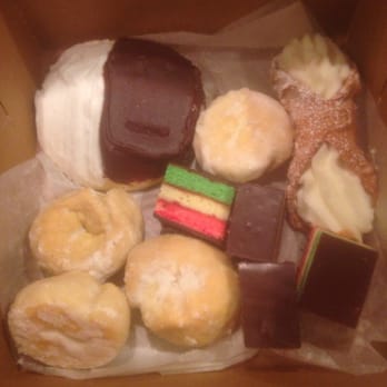 Bella Napoli - Black and white cookie, rainbow cookies, frosted lemon and a cannoli. - Bakeries Near Me - Latham, New York
