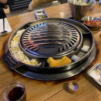 Jin BBQ - grill with the sides of pumpkin, steamed egg, creamy cheese and corn, rice puffs - Korean Near Me - Mesa, Arizona