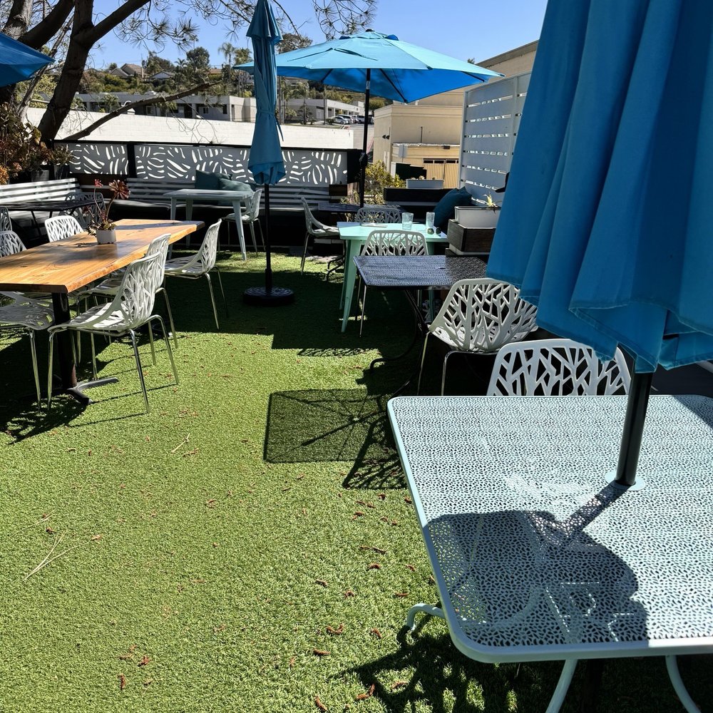 Naked Cafe - The lovely back patio. - Breakfast & Brunch Near Me - Encinitas, California Naked Cafe - The lovely back patio. - Breakfast & Brunch Near Me - Encinitas, California