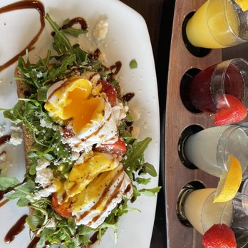 Broken Yolk Cafe - Avocado toast with pouched eggs - Breakfast & Brunch Near Me - Orange, California Broken Yolk Cafe - Avocado toast with pouched eggs - Breakfast & Brunch Near Me - Orange, California