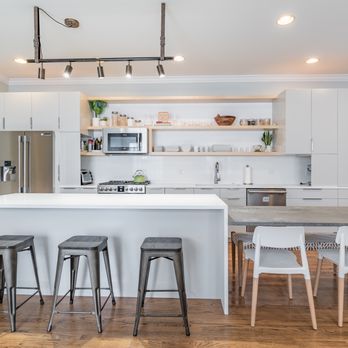 First Choice Remodeling & Development Group - a kitchen with a breakfast bar - General Contractors Near Me - Northbrook, Illinois