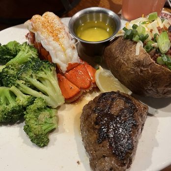 Outback Steakhouse - Tuesday Tails: 6 oz center cut sirloin, lobster tail, loaded baked potato, seasonal veggies - Steakhouses Near Me - Westminster, California Outback Steakhouse - Tuesday Tails: 6 oz center cut sirloin, lobster tail, loaded baked potato, seasonal veggies - Steakhouses Near Me - Westminster, California