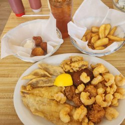 Captain Bill's Seafood & Steak Restaurant - This is combo plate shrimp, flounder, scallops and oysters.