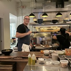 Perso - Chef at work in own kitchen